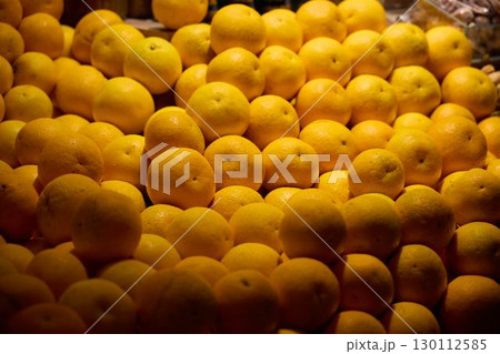 A Vibrant Showcase of Fresh Lemons Beautifully Piled High for Sale at the Local Market A Vibrant Showcase of Fresh Lemons Beautifully Piled High for Sale at the Local Market 130112585