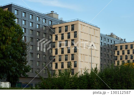 Modern urban architecture showcases innovative facades that enhance aesthetics and functionality Modern urban architecture showcases innovative facades that enhance aesthetics and functionality 130112587