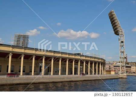 A Historic Stadium Standing Proudly Along the Beautiful Waterway in the Vibrant City 130112657