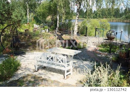 Enjoy a peaceful lakeside garden retreat with stunning, picturesque views all around Enjoy a peaceful lakeside garden retreat with stunning, picturesque views all around 130112742