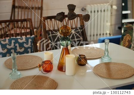An Exquisite Dining Table Setup, Featuring Unique Decor for a Stylish Ambiance and Experience An Exquisite Dining Table Setup, Featuring Unique Decor for a Stylish Ambiance and Experience 130112743