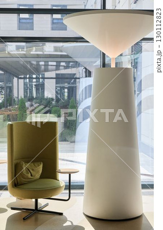 Explore Contemporary Interior Design with a Unique Chair and Elegant Lamp for Your Space 130112823