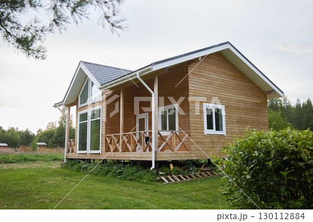 A Charming Wooden House Nestled in the Heart of Natures Breathtaking Beauty and Serenity 130112884