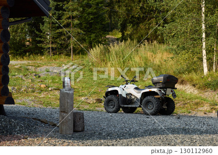 Enjoy an exhilarating ATV adventure exploring stunning offroad landscapes in nature Enjoy an exhilarating ATV adventure exploring stunning offroad landscapes in nature 130112960