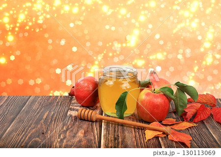 Autumn composition with apples, honey, pomegranate on an old wooden table. Harvesting concept, Jewish New Year Rosh Hashanah background, ecological food. Healthy eating, body detoxification, selective Autumn composition with apples, honey, pomegranate on an old wooden table. Harvesting concept, Jewish New Year Rosh Hashanah background, ecological food. Healthy eating, body detoxification, selective 130113069