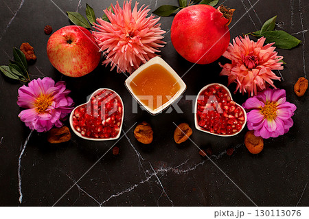 Autumn banner with honey, apples, pomegranates, flowers, dried fruits on marble background, composition for Jewish holiday Rosh Hashanah, autumn greeting and thanksgiving concept, Autumn banner with honey, apples, pomegranates, flowers, dried fruits on marble background, composition for Jewish holiday Rosh Hashanah, autumn greeting and thanksgiving concept, 130113076