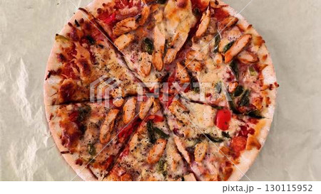 Enjoy a delicious Chicken Pizza topped with fresh ingredients and delightful flavors Enjoy a delicious Chicken Pizza topped with fresh ingredients and delightful flavors 130115952
