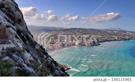 Experience the captivating and breathtaking coastal view of a modern cityscape right by the sea Experience the captivating and breathtaking coastal view of a modern cityscape right by the sea 130115965