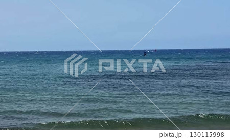 Experience a Serene Ocean View with Gentle Waves, Crystal Waters, and Clear Beautiful Skies Experience a Serene Ocean View with Gentle Waves, Crystal Waters, and Clear Beautiful Skies 130115998