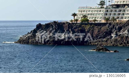 Experience the Stunning Coastal View Featuring a Hotel Beautifully Overlooking the Ocean 130116005