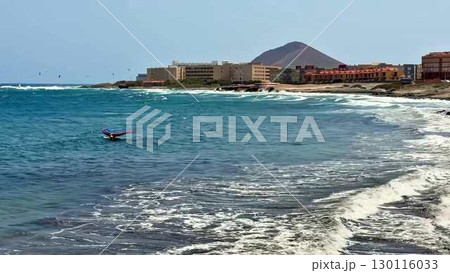 Enjoy vibrant coastal waters with thrilling surf action and a stunning scenic backdrop 130116033