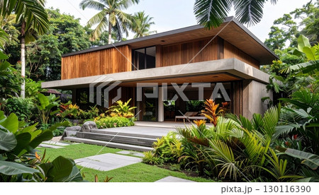Traditional wooden village house with a gazebo, surrounded by a summer nature park 130116390