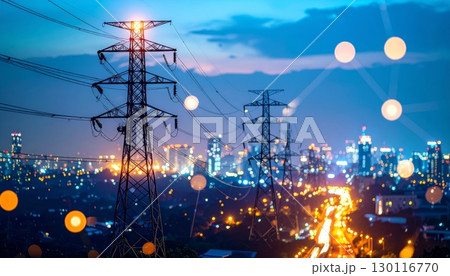 Powerful transmission lines cut across the industrial city skyline at sunset 130116770