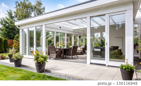 A new luxury gazebo is constructed on a front lawn of a suburban family residence 130116848