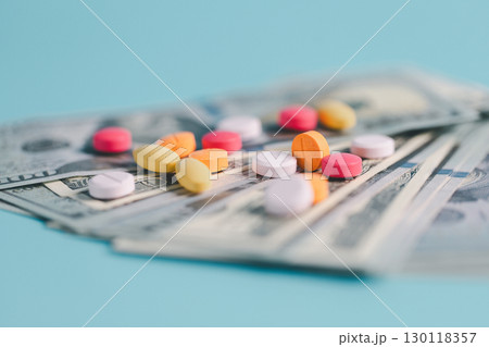 Expense of health care involves navigating pharmaceutical costs, prescription pills, medicine, finance, insurance, pharmacy support crucial roles in treating disease, covering necessary medicals. 130118357