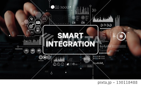 Hands Typing on Keyboard with Digital Overlay of Data Graphics Signifying Smart Integration in Technology and Business. Asymptotic smart data analytic 130118488
