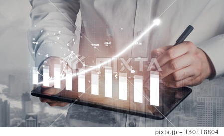 Business professional analyzing financial data on digital tablet with growth chart and city skyline in background, modern office concept Copula Business professional analyzing financial data on digital tablet with growth chart and city skyline in background, modern office concept Copula 130118804