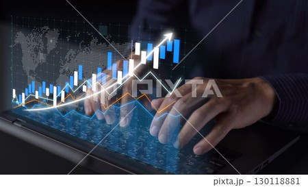 Hands Typing on Laptop with Financial Chart Displaying Growth and Data Analysis in Digital Workspace Environment for Business Strategy Development Copula 130118881