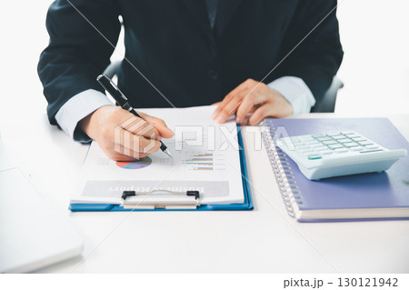 Businesswoman analysis with financial data, marketing business strategy project, Business financing accounting banking concept, finances, calculate about cost to real estate investment, tax system. Businesswoman analysis with financial data, marketing business strategy project, Business financing accounting banking concept, finances, calculate about cost to real estate investment, tax system. 130121942