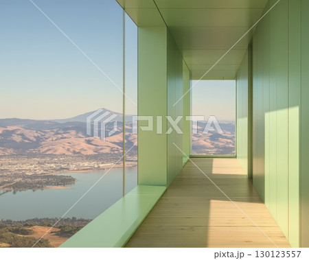 A long hallway with a view of a city and a lake 130123557