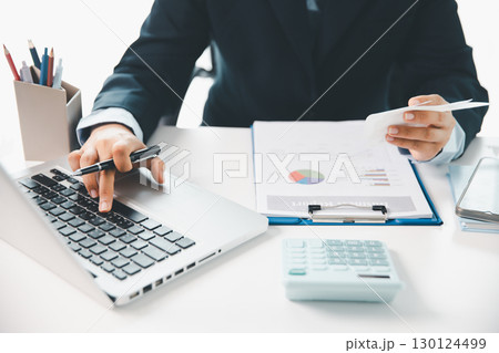 Woman calculating monthly home expenses, taxes, bank account balance and credit card bills payment, Income is not enough for expenses. financial planning, business calculate tax, investment finance. Woman calculating monthly home expenses, taxes, bank account balance and credit card bills payment, Income is not enough for expenses. financial planning, business calculate tax, investment finance. 130124499