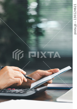 Consultant facilitates consultation between bookkeepers, lawyer to review accounting balance sheet, stock market statistics, yearly tax obligations, ensuring business is protected from bribery, law. 130124621