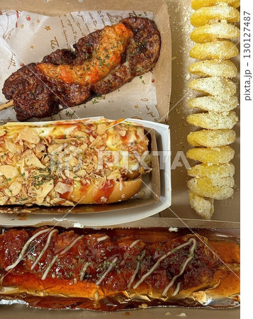 Bunsik, a popular Korean street food, includes various dishes like tteokbokki, odeng, and gimbap. It's a tasty, comforting snack loved by many, perfect for casual gatherings or quick bites. Bunsik, a popular Korean street food, includes various dishes like tteokbokki, odeng, and gimbap. It's a tasty, comforting snack loved by many, perfect for casual gatherings or quick bites. 130127487