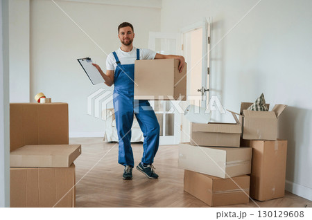 Room full of boxes. Moving service employee 130129608