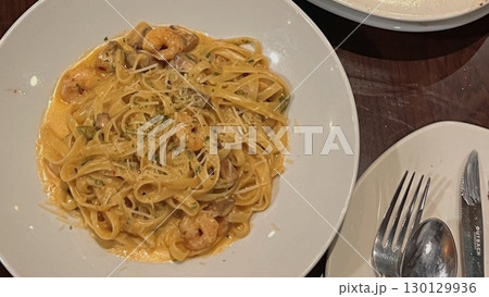 Creamy spaghetti carbonara made with rich egg yolk sauce, crispy bacon, parmesan cheese, and freshly ground black pepper for a classic, indulgent Italian pasta dish. Creamy spaghetti carbonara made with rich egg yolk sauce, crispy bacon, parmesan cheese, and freshly ground black pepper for a classic, indulgent Italian pasta dish. 130129936