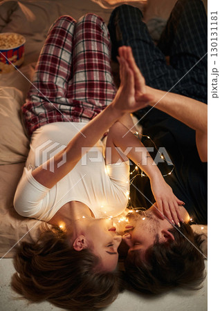 Couple celebrating New Year together Couple celebrating New Year together 130131181