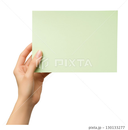 Hand holding blank light green paper 130133277