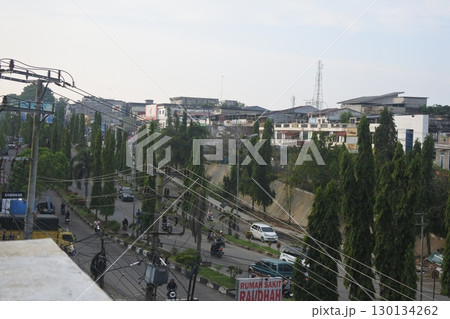 city view and green trees city view and green trees 130134262
