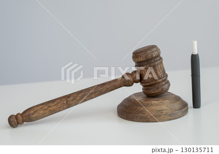 Judge's gavel and electronic cigarette. Tobacco heating system.  130135711
