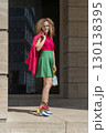 Woman on the background of the business building 130138395