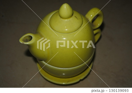 ceramic teapot with yellow teapot and cup ceramic teapot with yellow teapot and cup 130139093