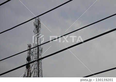 barbed wire fence with blue sky 130139201