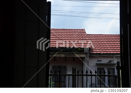 stylish balcony with a metal railing 130139207