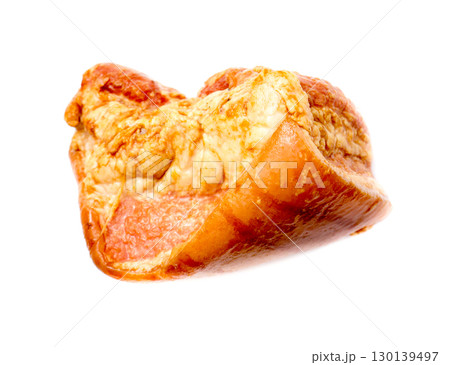A piece of smoked ham on a white background. 130139497
