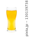 Golden Beer Glass with Frothy Head and Bubbles on Clean White Background 130139738