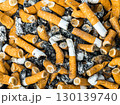 Discarded cigarette butts and ash create powerful anti-smoking awareness campaign visual 130139740
