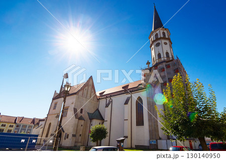 levoca, slovakia - 28 aug, 2016: church architecture of slovakia in summer. basilica of st. james in levoca town. travel europe to discover unesco heritage sites. sunny day with blue sky levoca, slovakia - 28 aug, 2016: church architecture of slovakia in summer. basilica of st. james in levoca town. travel europe to discover unesco heritage sites. sunny day with blue sky 130140950