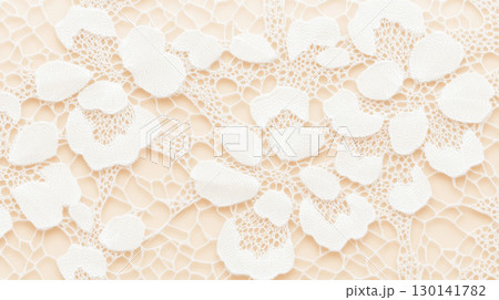 Lace textile background featuring intricate floral patterns, perfect for creative design projects 130141782