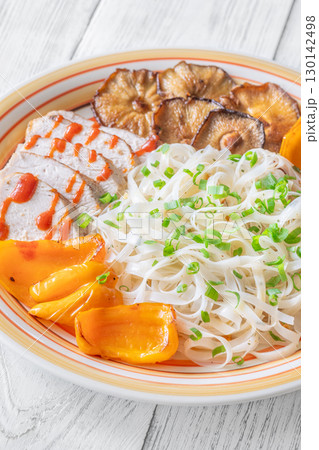 Rice Noodles with Shiitake, Grilled Peppers, Chicken, Sriracha, and Green Onion 130142498