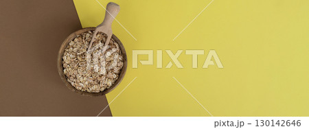 Raw oatmeal porridge copy space. Whole spelt grain species. High protein fiber-rich vegan plant based food ingredient. Gluten free superfood healthy nutritional dietary alternative Raw oatmeal porridge copy space. Whole spelt grain species. High protein fiber-rich vegan plant based food ingredient. Gluten free superfood healthy nutritional dietary alternative 130142646