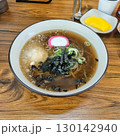 The images show a bowl of cold soba noodles, a refreshing and popular dish often served with broth, shredded seaweed, and green onions. 130142940