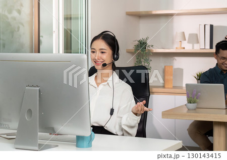 Call Center Agent Providing Customer Support with Headset Call Center Agent Providing Customer Support with Headset 130143415