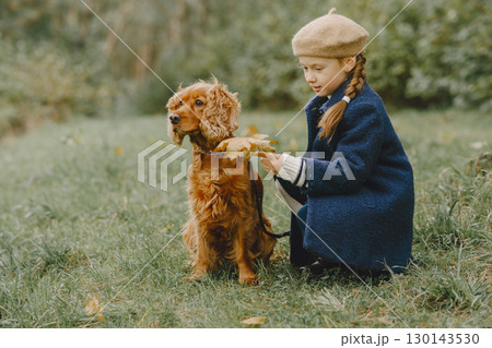 Friends are having fun in the fresh air. Child in a blue coat. Friends are having fun in the fresh air. Child in a blue coat. 130143530