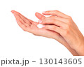 Female hands with a cream 130143605