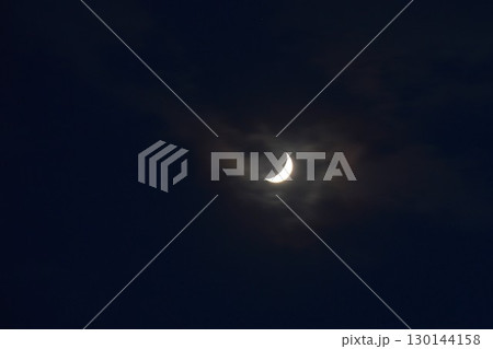 half moon covering by cloud floating on sky in night background 130144158