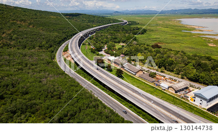 Drone shot The M6 motorway Nakhon Ratchasima Province - Bang Pa-in Lam Ta Khong River and Mountain. Motorway Korat Thailand 130144738